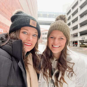 Two women taking a selfie outside of Mall of America