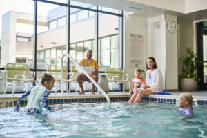 image of family at a hotel pool