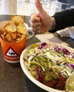 A falafel bowl and fries