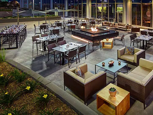 Outdoor patio setup at Cedar & Stone, Urban Table