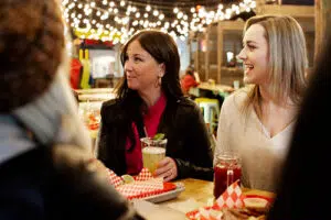 A group of friends enjoying drinks at Fair on 4