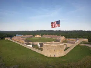 A military fort (Historic Fort Snelling) with an American flag flying