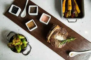 Brussels sprouts, carrots, and a side of bread