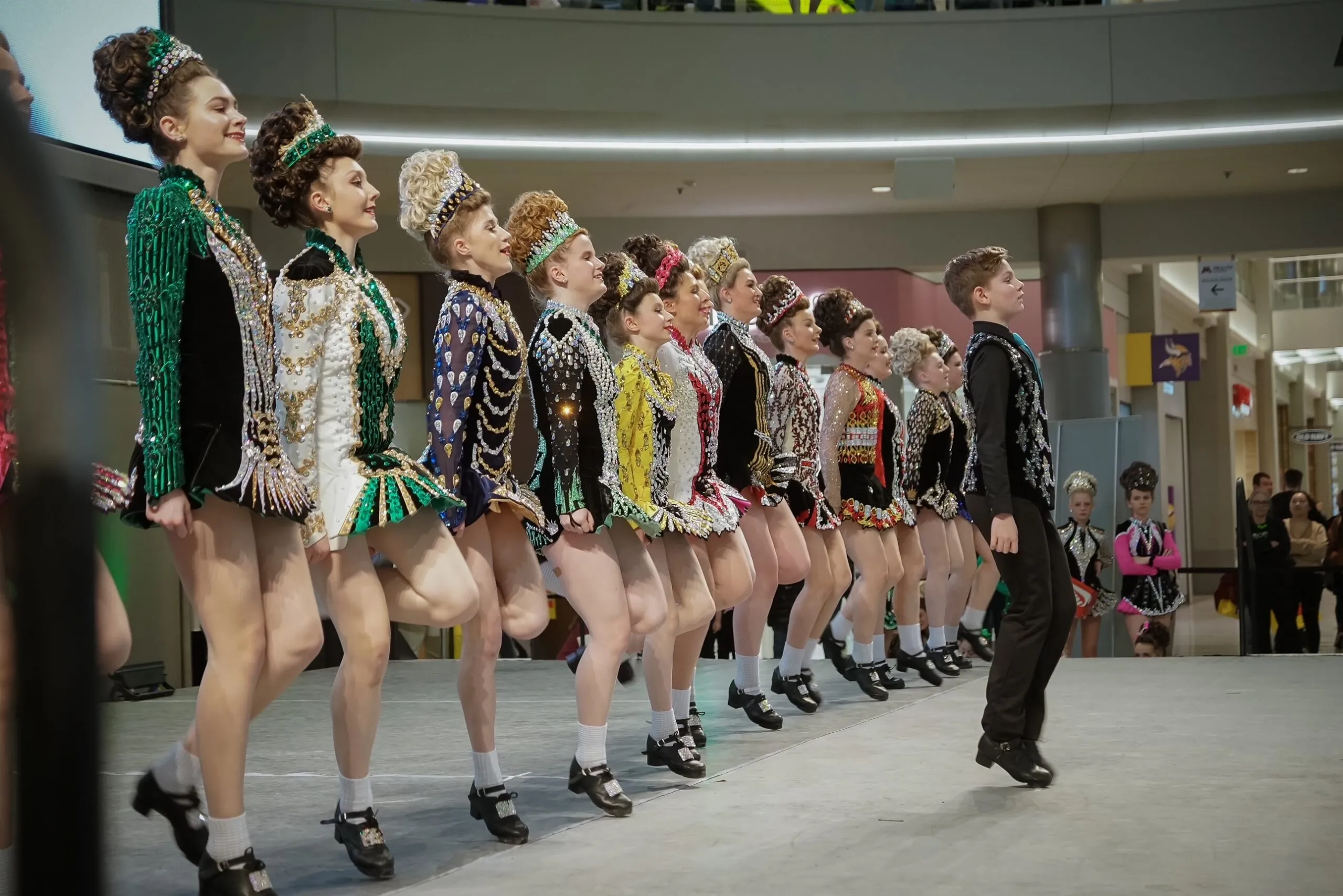 Irish dancers dance on stage