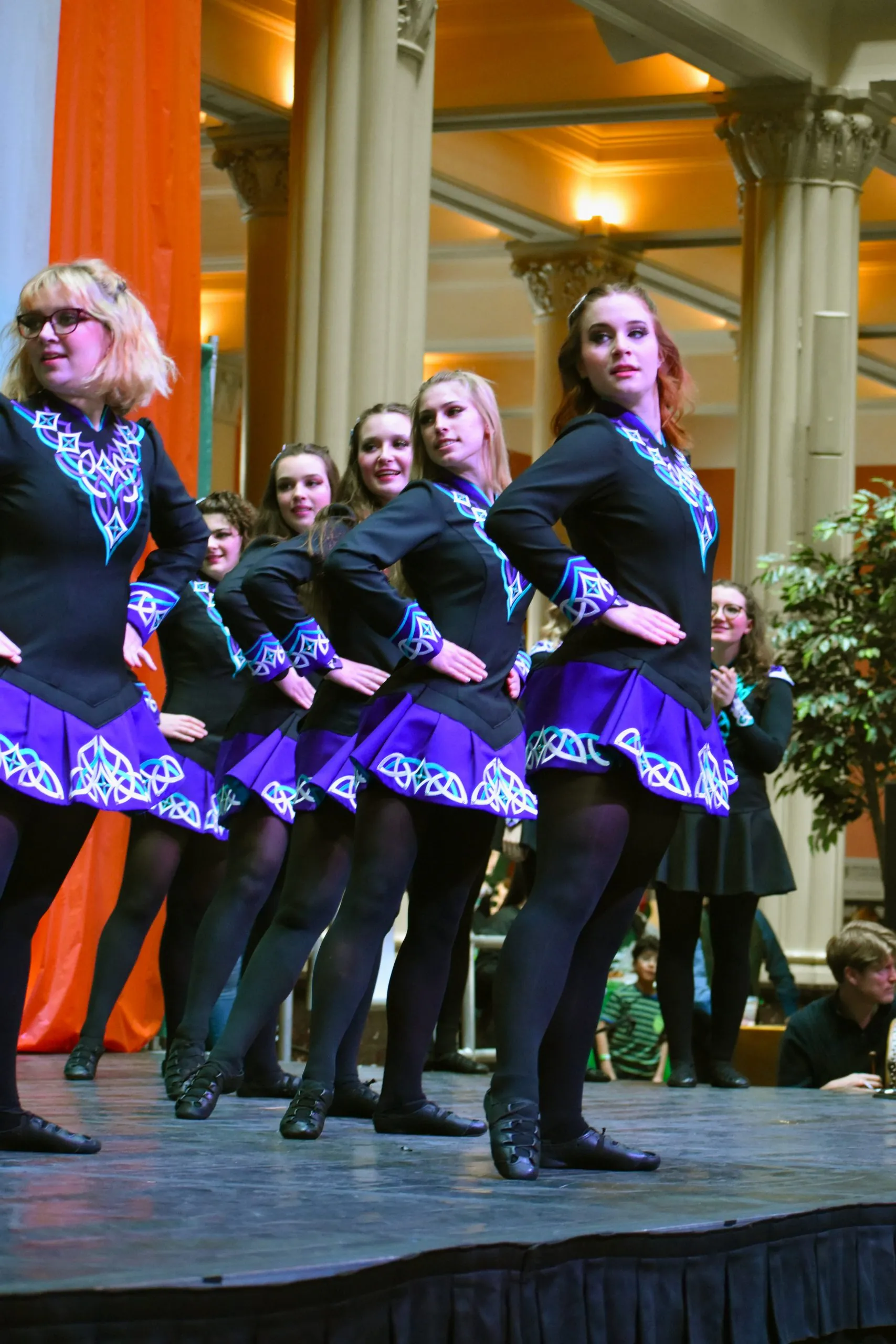 A group of Irish dancers on a stage